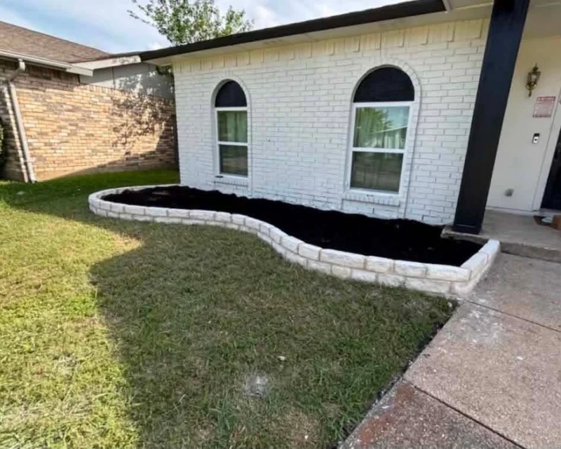 Austin stone foundation planting bed