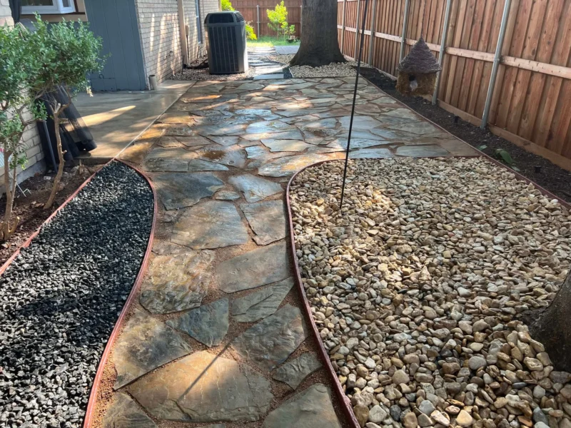 Customer flagstone patio and rock beds