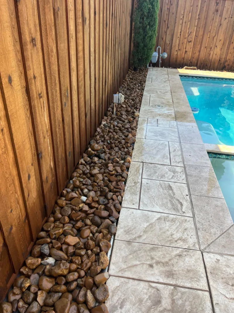 River rock poolside border
