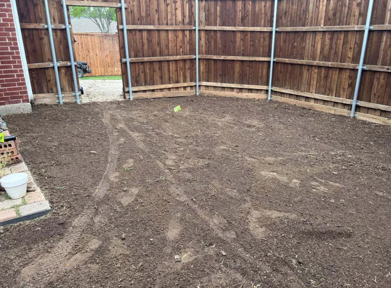 Before sod installation: enclosed backyard lawn