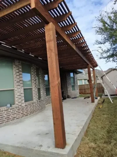Wood pergola and concrete patio: work in progress, view 2