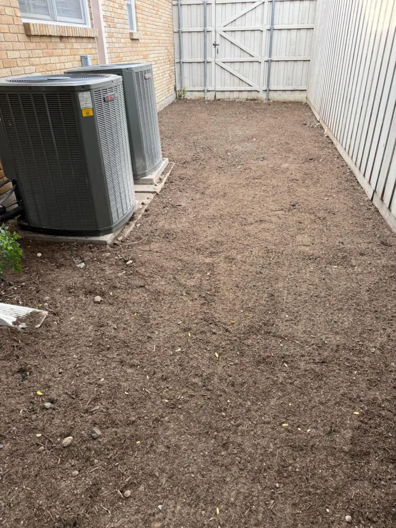 Side yard prepared for sod after patio removal