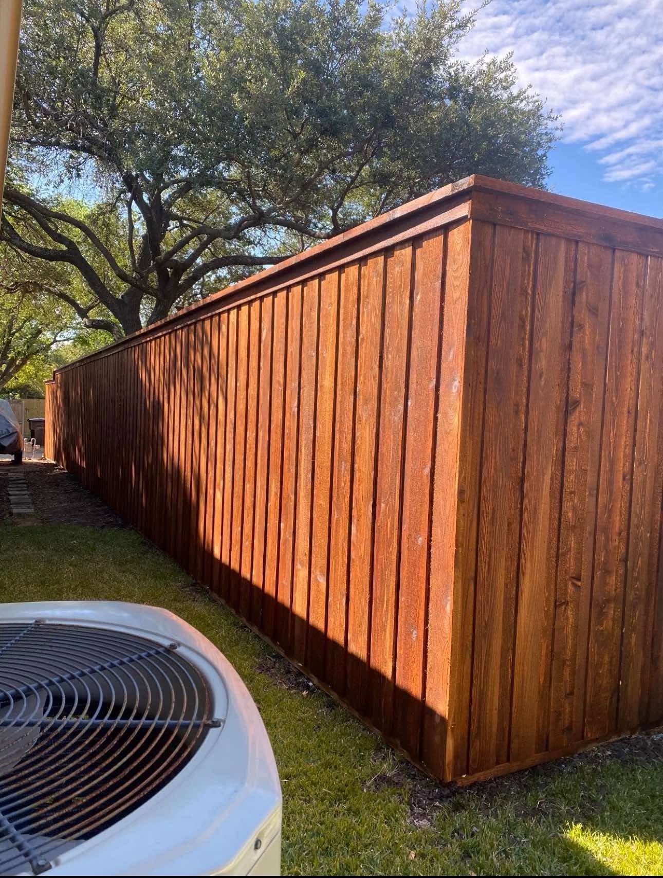 Vertical wood fence with cap and corner detail in Plano — Plano Landscaping customer project